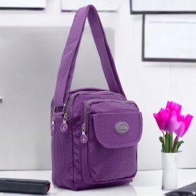 Maletita tipo Kipling Morado