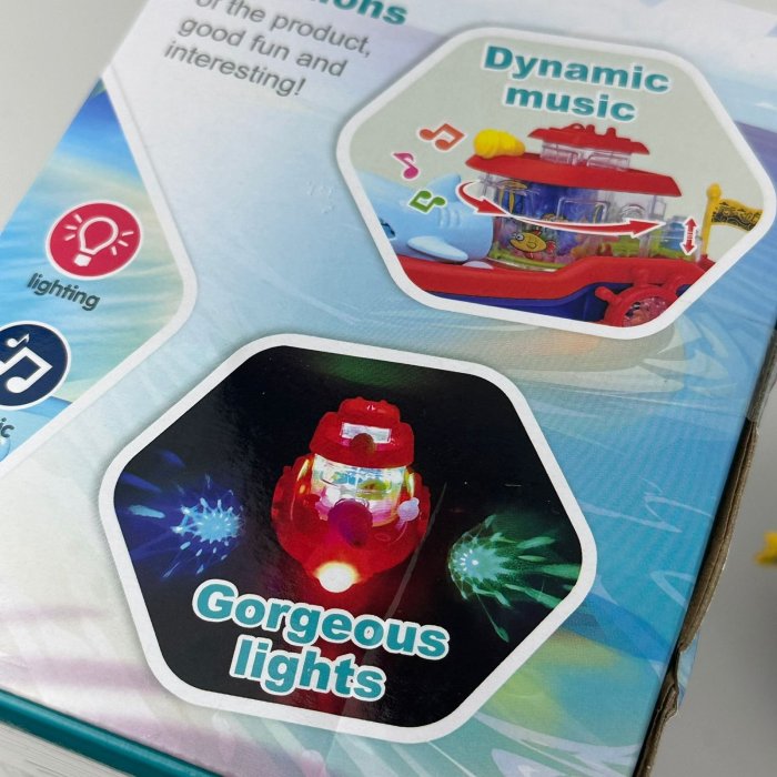 Barco de juguete Shark con luces, música, cañón de agua y acuario