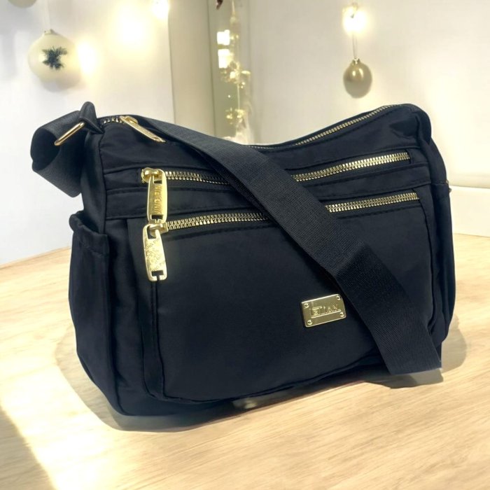Bolsa crossbody para dama con múltiples compartimentos