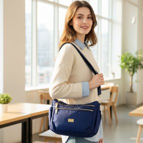 Bolsa crossbody para dama con múltiples compartimentos