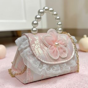 Bolsa infantil pink coquette con cadena y asa decorativa