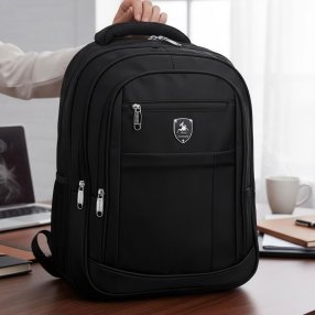 Mochila amplia con múltiples compartimentos, ideal para escuela o trab