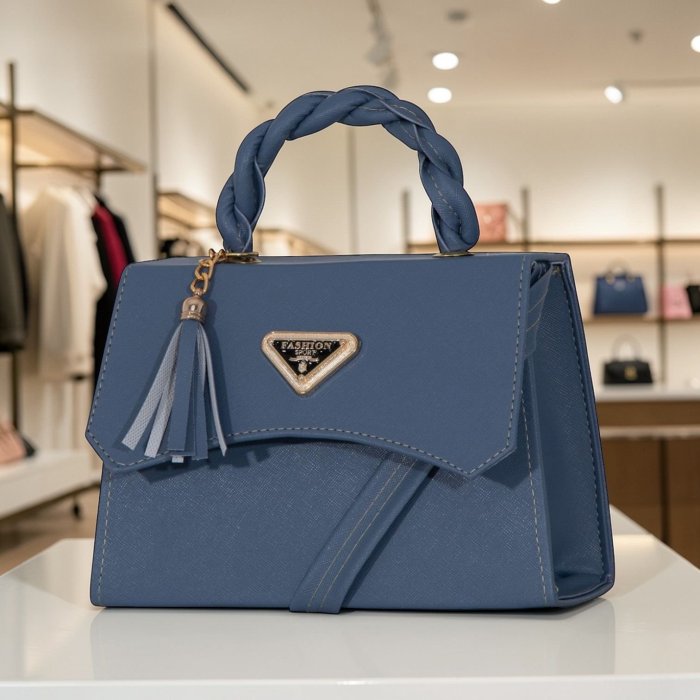 Cross azul estructurada elegante con asa trenzada