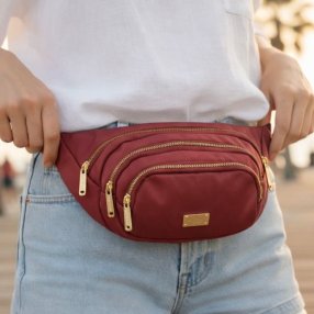 Cangurera crossbody vino para dama con múltiples compartimentos
