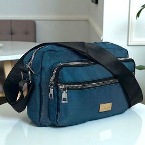 Bolso crossbody jade compacto con múltiples compartimentos