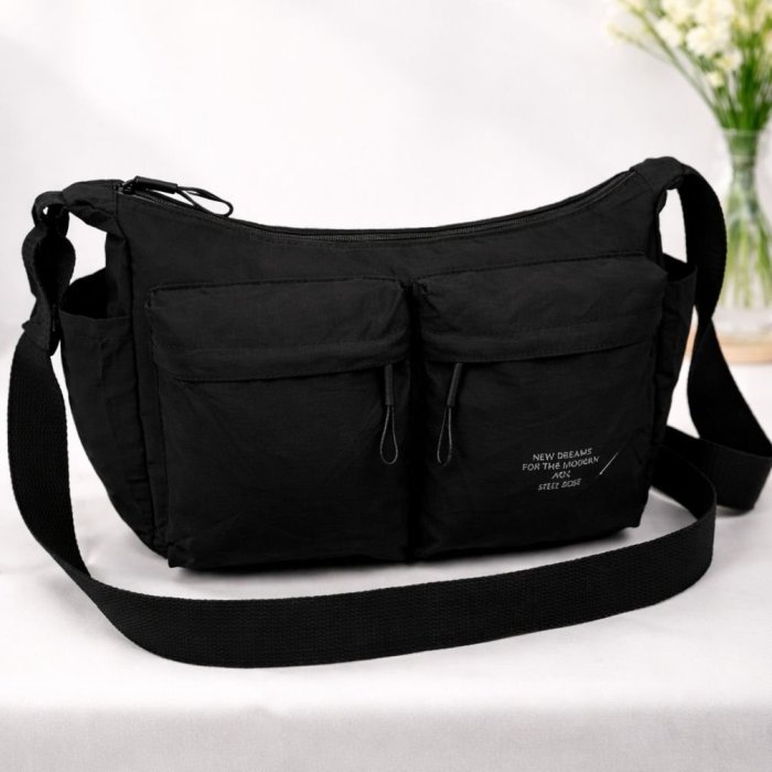 Bolsa crossbody negro amplia con bolsillos frontales