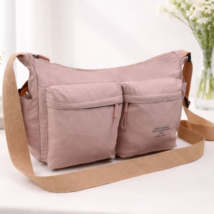 Bolsa crossbody amplia con bolsillos frontales