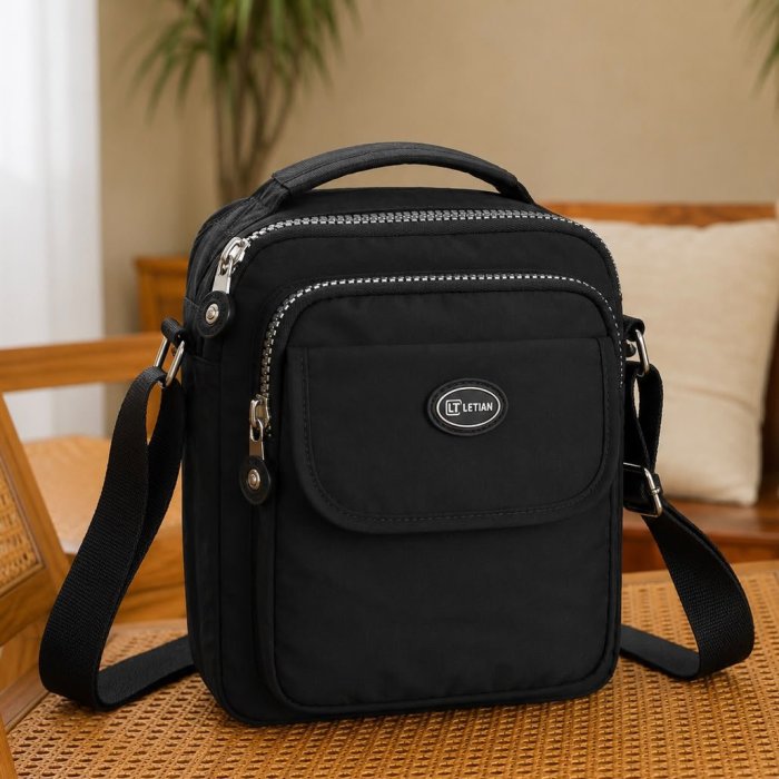 Bolso cross negro compacto para mujer ideal para uso diario