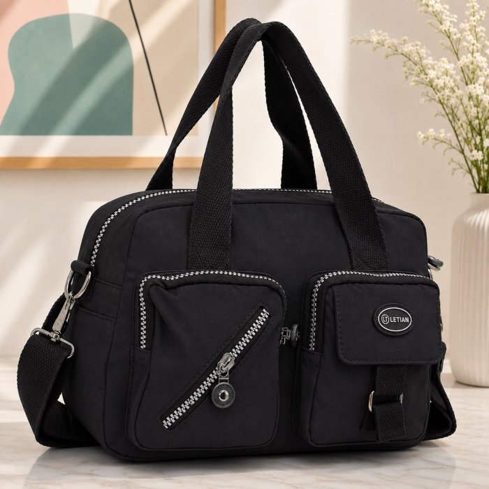 Bolsa negra multiusos con doble asa y correa ajustable
